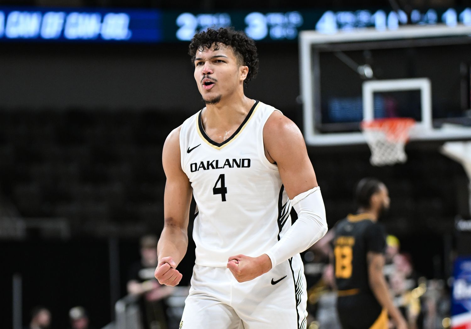 Mar 12, 2024; Indianapolis, IN, USA; Oakland Golden Grizzlies forward Trey Townsend (4) celebrates after a play against the Milwaukee Panthers during the second half at Indiana Farmers Coliseum. Mandatory Credit: Robert Goddin-USA TODAY Sports